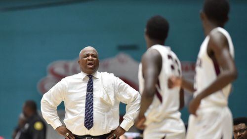 Tucker boys basketball coach James Hartry shouts instructions in March during the GHSA finals  in Macon. The Tigers lost to Tri-Cities in that Class AAAAAA final. They are ranked No. 1 with a 19-2 record this season. Photo: HYOSUB SHIN / HSHIN@AJC.COM