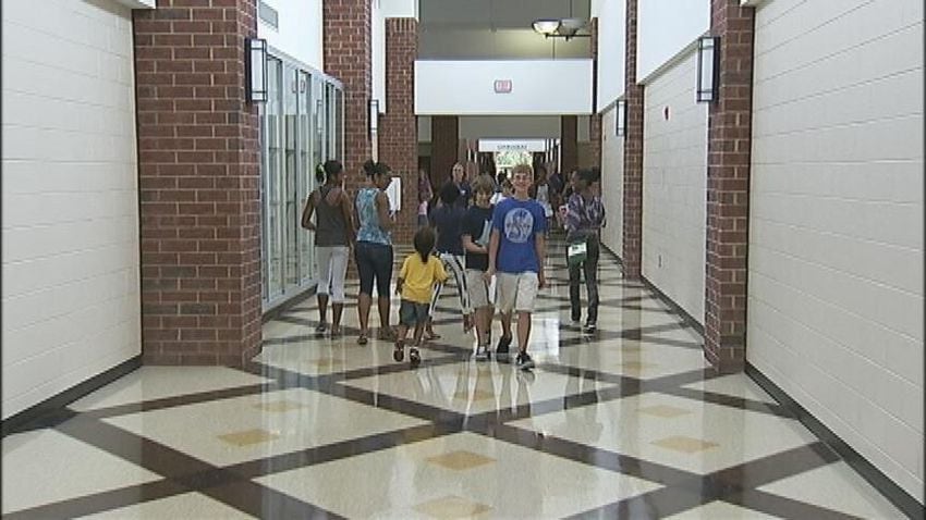 Students arrive for the first day of school.