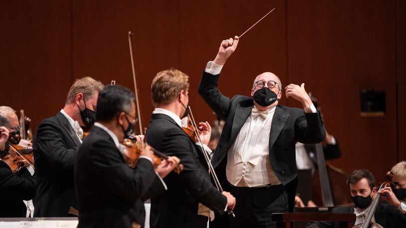 Conductor Robert Spano leads the Atlanta Symphony Orchestra in the "Star Spangled Banner," a tradition before every season-opening concert. / Courtesy of Rand Lines