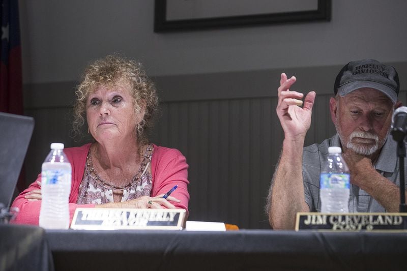 Mayor Theresa Kenerly (left) and City Councilman Jim Cleveland during a City Council meeting at the Hoschton Historic Train Depot in Hoschton on Monday, May 6, 2019. 