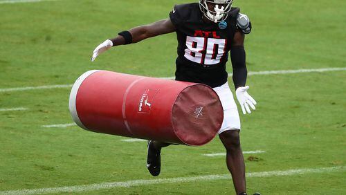 082420 Flowery Branch: Atlanta Falcons wide receiver Laquon Treadwell hits a tackling dummy running a route drill during the second scrimmage on Monday, August 24, 2020 in Flowery Branch.    Curtis Compton ccompton@ajc.com 