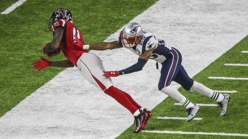 FEBRUARY 5, 2017 HOUSTON TX Julio Jones keeps both feet in on this reception against Patriot defender, Eric Rowe tries to push him out. The Atlanta Falcons meet the New England Patriots in Super Bowl LI at NRG Stadium in Houston, TX, Sunday, February 5, 2017. John Spink/AJC
