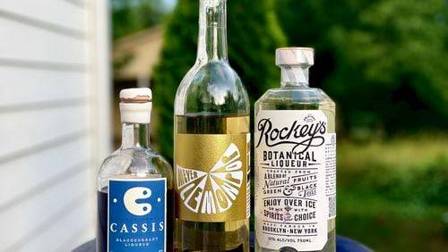 C Cassis, Meyer Lemonpop and Rockey’s Botanical Liqueur have a lot of flavor, but not the punch of a higher proof product. Krista Slater for The Atlanta Journal-Constitution