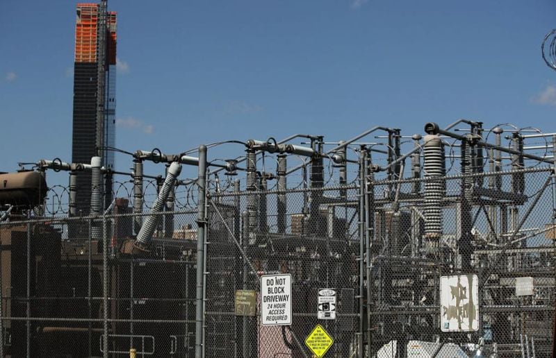 A Con Edison power plant in a Brooklyn neighborhood across from Manhattan in New York City.  As US officials step up sanctions on Russian intelligence for its interference in the 2016 elections, members of the Trump administration have accused Russia of a cyber-assault on the domestic energy grid and other key parts of America's infrastructure.  