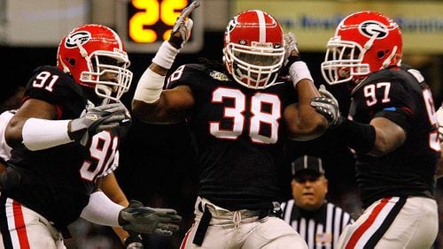 Former UGA player Marcus Howard (38) celebrates after a sack in the 2008 Sugar Bowl. Howard was named MVP of Georgia's 41-10 victory over Hawaii.