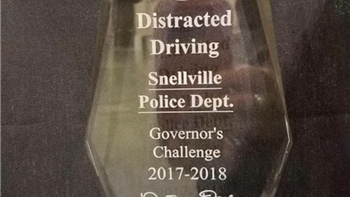 The Snellville Police Department was recognized recently at the 19th Annual Governor’s Challenge Awards as the top agency in the state for its efforts to educate the public about the dangers of distracted driving and enforcement of distracted driving laws. Courtesy City of Snellville