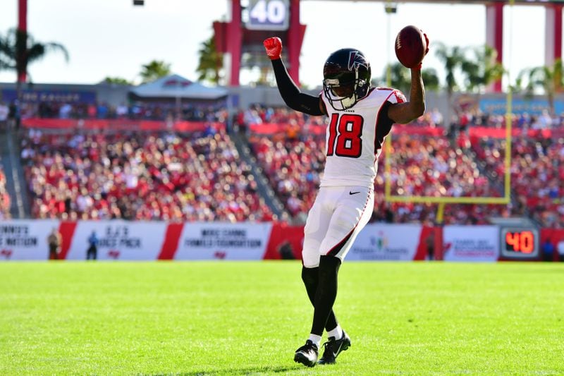 TAMPA, FLORIDA - DECEMBER 30: Calvin Ridley #18 of the Atlanta Falcons celebrates as he runs into the endzone to score during the fourth quarter against the Tampa Bay Buccaneers at Raymond James Stadium on December 30, 2018 in Tampa, Florida. The Falcons won 34-32. (Photo by Julio Aguilar/Getty Images)