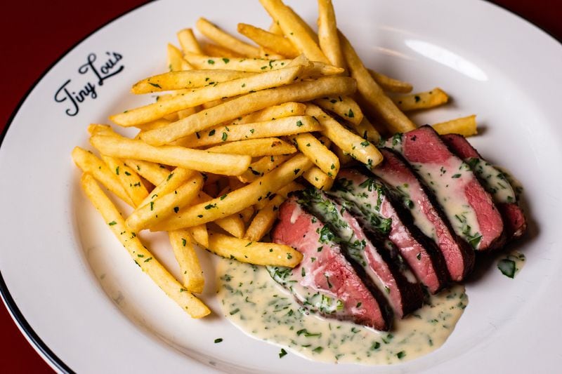 The steak frites dish at Tiny Lou’s is as classic as it gets. 