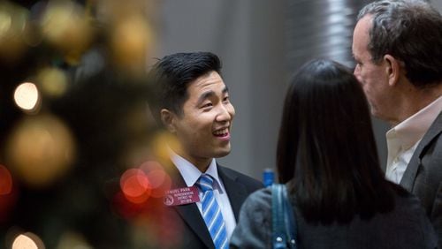 Sam Park, the first openly gay man to be elected to Georgia’s General Assembly, talks with guests earlier this month during a victory party in Atlanta. Branden Camp/Special