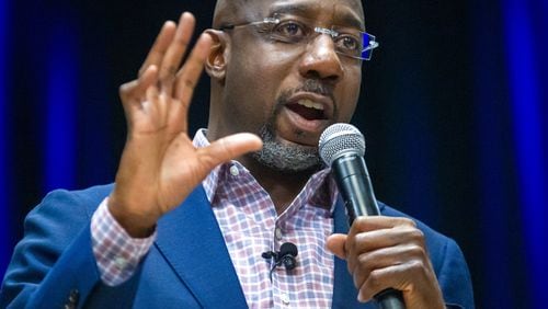  U.S. Sen. Raphael Warnock speaks during a town hall meeting at the Maloof Auditorium in Decatur Friday, February 4, 2022. 
  STEVE SCHAEFER FOR THE ATLANTA JOURNAL-CONSTITUTION