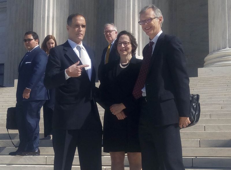 Fane Lozman, left, with his attorneys, Stanford University law professors Pamela Karlan and Jeffrey Fisher outside of the United States Supreme Court, Tuesday February 27, 2018. (Photo Jane Musgrave)