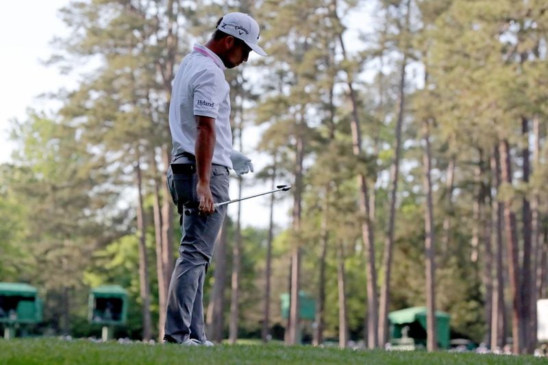 Xander Schauffele reacts after hitting his ball in the water on the 16th tee during the final round of the Masters Tournament Sunday, April 11, 2021, at Augusta National Golf Club in Augusta. (Curtis Compton/ccompton@ajc.com)