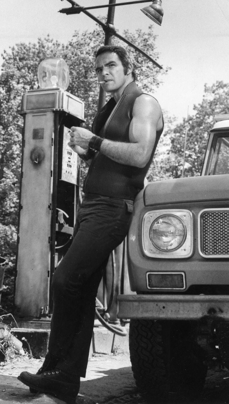 Burt Reynolds at rural gas station in film “Deliverance.” 1972