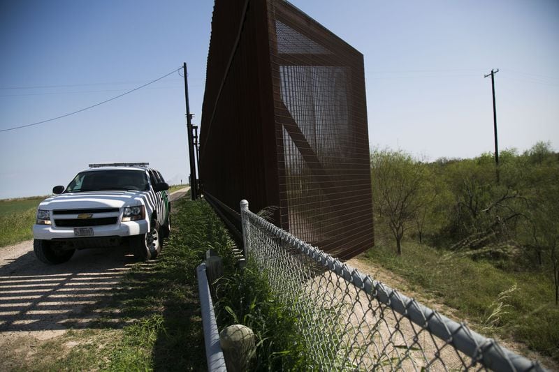 A Border Patrol vehicle guards a section of the border fence in Runn, Texas, earlier this year. The patchwork border fence along the Texas-Mexico border has created a nebulous and bizarre third space between countries.