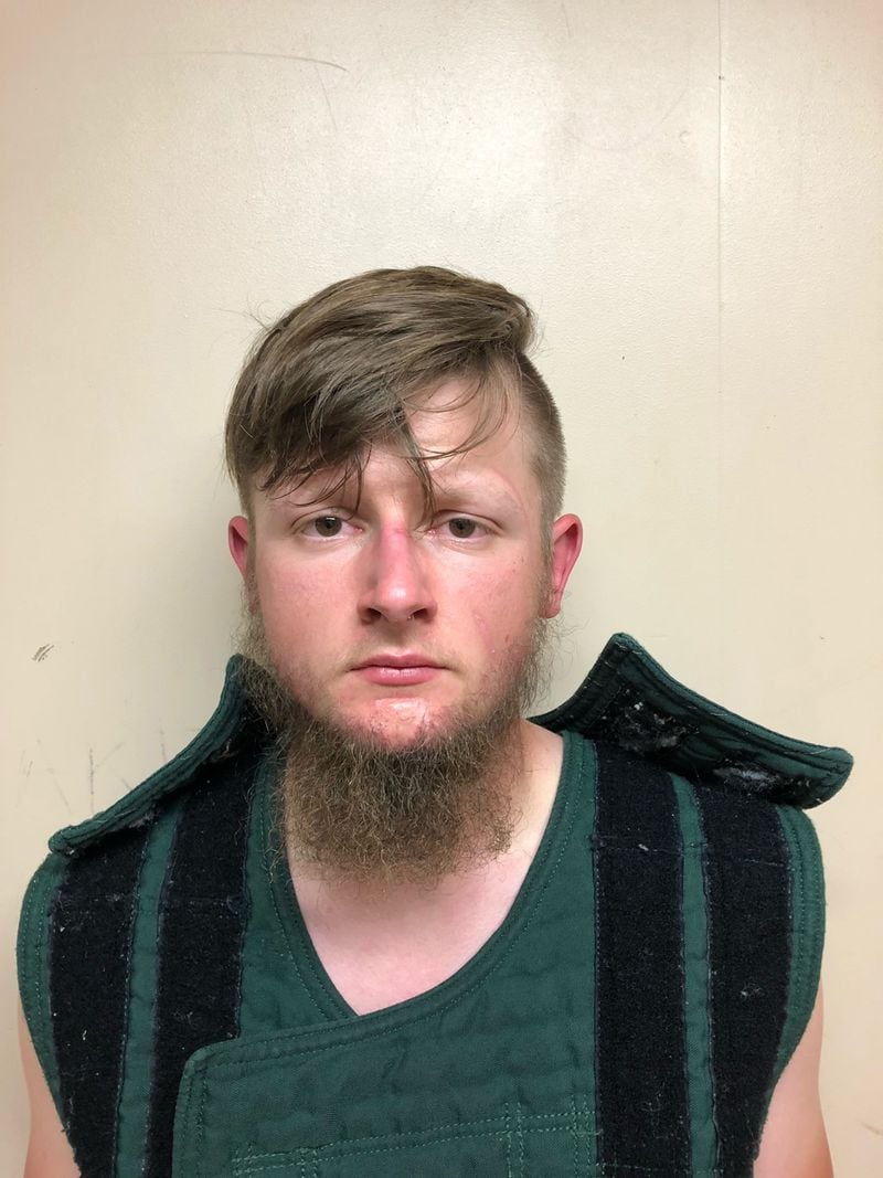 In this handout provided by the Crisp County Sheriff's Office, Robert Aaron Long is pictured in a jail booking photo on March 16, 2021, in Cordele, Georgia. Long, 21, was arrested as the suspect in a series of shootings at three Atlanta-area spas. (Crisp County Sheriff's Office/Getty Images/TNS)