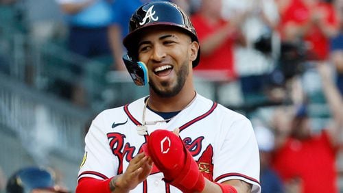 Atlanta Braves left fielder Eddie Rosario reacts after he scored on a single by Orlando Arcia during the eighth inning against the Washington Nationals at Truist Park at Truist Park on Sunday, Oct. 1, 2023, in Atlanta.  Miguel Martinez / miguel.martinezjimenez@ajc.com
