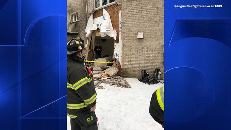 A 74-year-old man crashed through a garage wall on Sunday barreling off a 20-foot cliff behind the home. Firefighters survey the damages