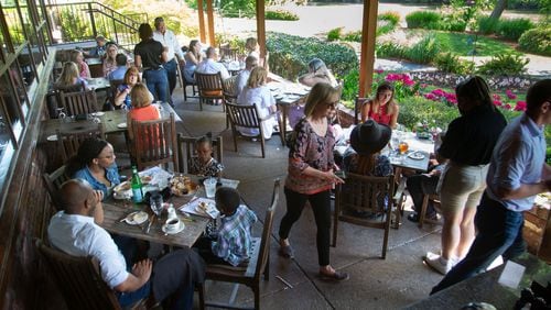Now that Atlanta restaurants such as Canoe, shown here on this year's Mother's Day, are getting busier, issues such as staffing are a problem. (Steve Schaefer for The Atlanta Journal-Constitution)