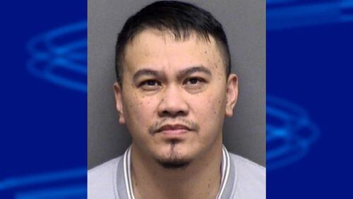 Hoang Nguyen is accused of swapping out price tags on high-end wine bottles.
