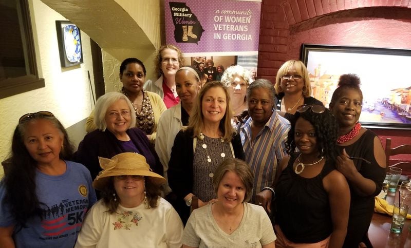 Amy Stevens (second from left, in white hair and black jacket) is a counselor and organizer of Georgia Military Women, a group of female veterans who stage meetups and go on outings as a way to bolster camaraderie. CONTRIBUTED: AMY STEVENS
