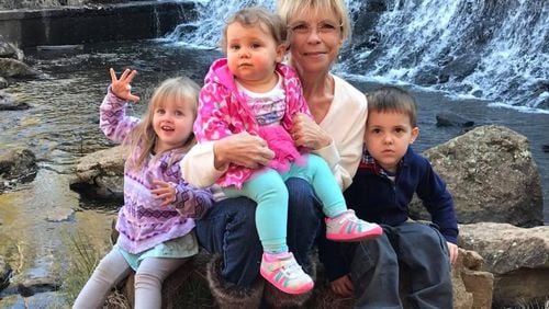 Holly Rogers with grandchildren Taylor, Abigail and PJ Jr.  Family photo
