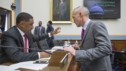 Rep. Trey Gowdy, R-S.C., right, confers with Rep. Cedric Richmond, D-La., on Capitol Hill in Washington, Wednesday, Nov. 18, 2015, as the House Judiciary Committee met to approve rare bipartisan legislation that would reduce prison time for some nonviolent drug offenders. Gowdy is a former federal prosecutor. (AP Photo/J. Scott Applewhite)
