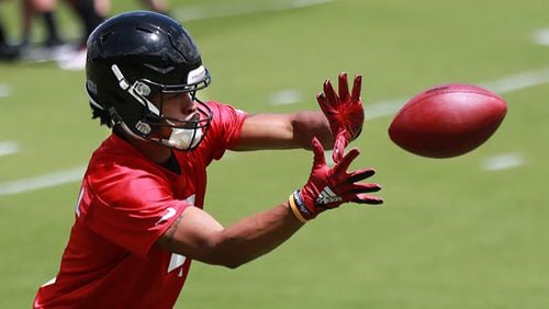 Falcons wide receiver TaQuon Marshall, formerly a Georgia Tech quarterback, catches a pass during rookie minicamp on Friday, May 10, 2019, in Flowery Branch. Curtis Compton/ccompton@ajc.com