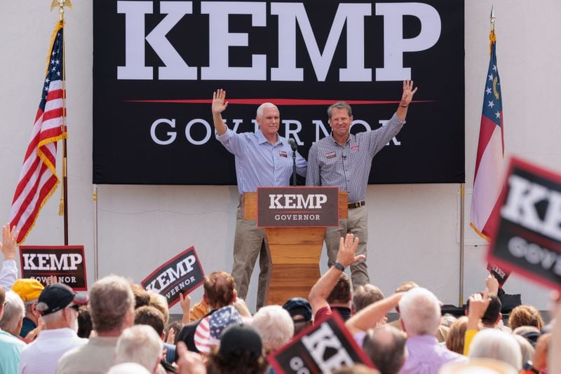 Gov. Brian Kemp campaigns with the support of former Vice President Mike Pence in Cumming on Tuesday, November 1, 2022. (Arvin Temkar / arvin.temkar@ajc.com)
