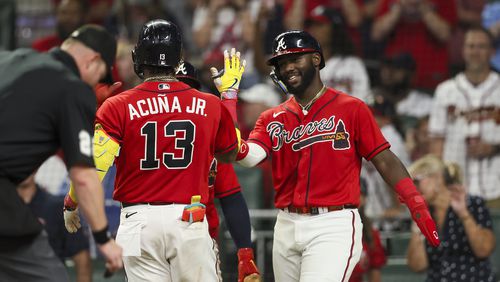 Atlanta Braves’ Ronald Acuna Jr. (13) celebrates with Atlanta Braves’ Michael Harris II after Acuna hit a two-run home run during the seventh inning against the Miami Marlins at Truist Park, Friday, June 30, 2023, in Atlanta. The Braves won 16-4. Jason Getz / Jason.Getz@ajc.com)