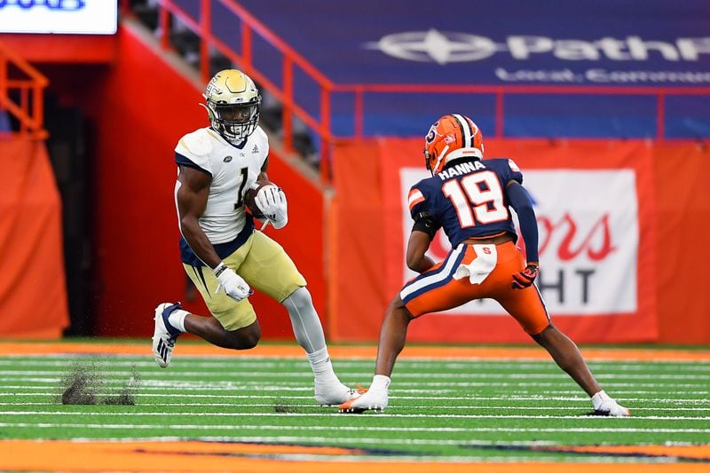 Georgia Tech Yellow Jackets wide receiver Jalen Camp (1) runs with the ball after a catch as Syracuse Orange defensive back Robert Hanna (19) defends during the first quarter at the Carrier Dome Sept. 26, 2020. Rich Barnes-USA TODAY Sports