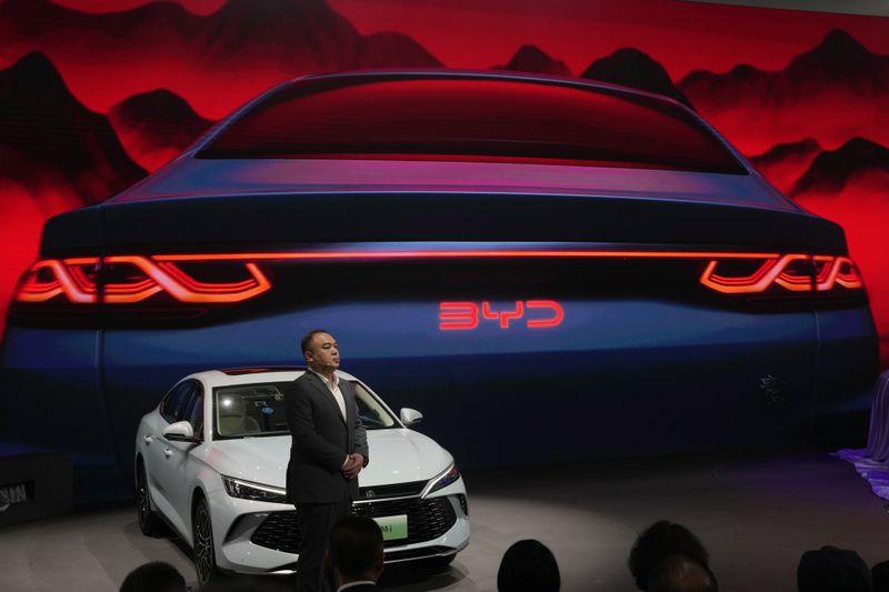 The BYD Qin L Dmi is unveiled during Auto China 2024 held in Beijing, Thursday, April 25, 2024. Global automakers and EV startups unveiled new models and concept cars at China's largest auto show on Thursday, with a focus on the nation's transformation into a major market and production base for digitally connected, new-energy vehicles. (AP Photo/Ng Han Guan)