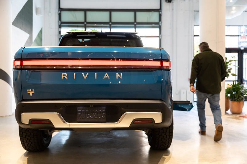 A Rivian R1T truck is seen at a media event marking the opening of the company’s new showroom at Ponce City Market in Atlanta on Thursday, Oct. 19, 2023. (Arvin Temkar / arvin.temkar@ajc.com)