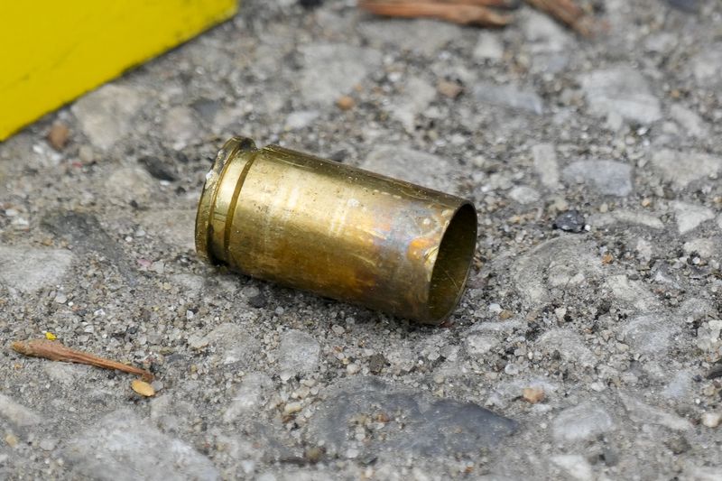A cartridge case lies at the scene of a shooting at an Eid event in Philadelphia, Wednesday, April 10, 2024. (AP Photo/Matt Rourke)