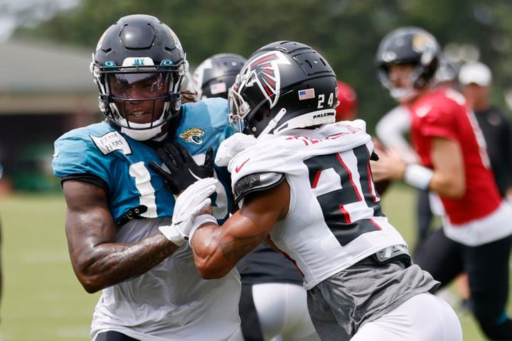 Atlanta Falcons cornerback A.J. Terrell (24) battles against Jacksonville Jaguars wide receiver Shenault Jr. Laviska (10) during a joint practice at the Falcons Training Facility in Flowery Branch on Wednesday, August 24, 2022.
 Miguel Martinez / miguel.martinezjimenez@ajc.com