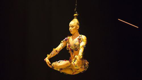 The Mirage number features an aerialist who appears to hang from her hair. The costumes for “Volta” are designed by Zaldy Goco. Contributed by Matt Beard