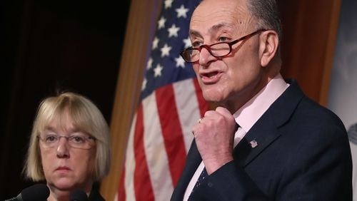 Senate Minority Leader Charles Schumer, D-N.Y., speaks Thursday while flanked by U.S. Sen. Patty Murray, D-Wash., during a news conference in Washington, D.C. Schumer called for an investigation into the business dealings of U.S. Rep. Tom Price, R-Roswell, before the Senate begins confirmation hearings on Price’s nomination to be the next secretary of health and human services. (Photo by Mark Wilson/Getty Images)
