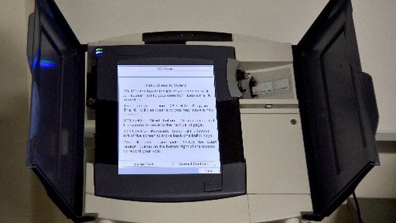 A voting machine at the Center for Election Systems at Kennesaw State University. The center since 2002 has worked on behalf of the state to oversee the operation of the machines and make sure the intricate web of Georgia’s voting system performs smoothly for every federal, state and county election. BRANT SANDERLIN/BSANDERLIN@AJC.COM