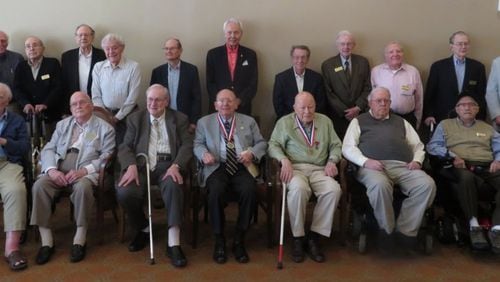 Lavelle Beene (front, third from the right) was a scout in the infantry during World War II and posed with 20 other veterans last year at the Lenbrook senior community in Buckhead. Photo courtesy of Jim Cochrane