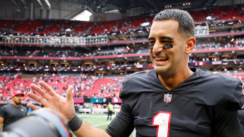 Falcons quarterback Marcus Mariota was all smiles after he led Atlanta to a 28-14 victory against the 49ers on Sunday at Mercedes-Benz Stadium. (Miguel Martinez / miguel.martinezjimenez@ajc.com)