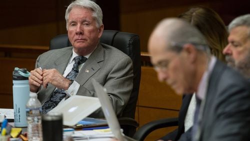 Tex McIver listens to the testimony of Atlanta Police Detective Darrin Smith during Friday’s testimony in the Tex McIver murder trial . STEVE SCHAEFER / SPECIAL TO THE AJC