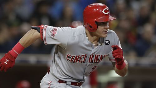 Cincinnati Reds' Scott Schebler bats during the ninth inning of a baseball game against the San Diego Padres Friday, April 19, 2019, in San Diego.