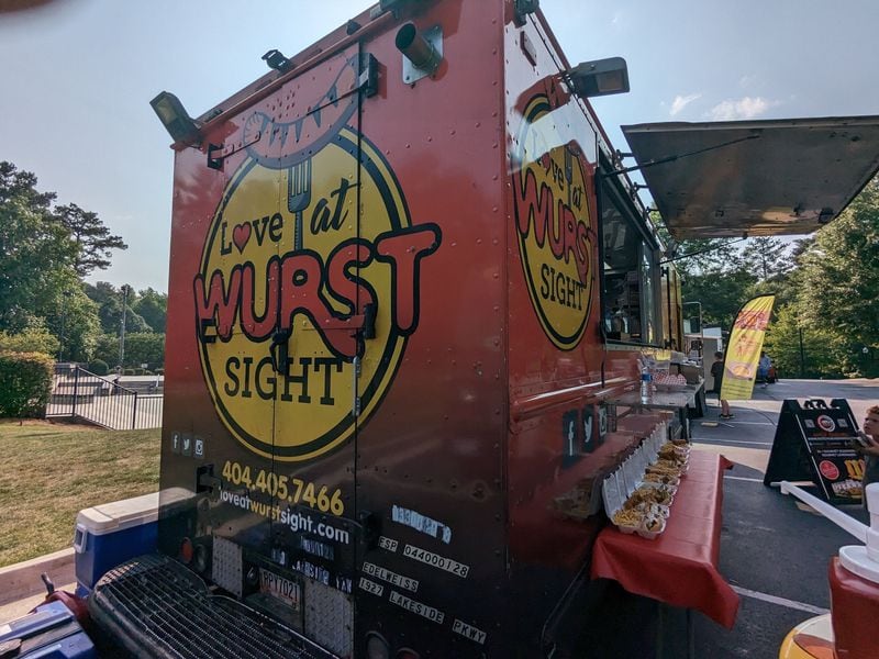 The Luv at Wurst Sight food truck offers a variety of grilled sausages and hot dogs. Paula Pontes for The Atlanta Journal-Constitution