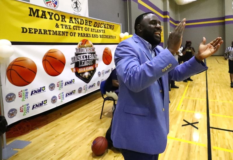 050422 Atlanta: Parks and Recreation Director Ramondo Davidson cheers the competition during Atlanta Mayor Andre Dickens’ Midnight Basketball League that serves as an anti-crime initiative at the C.T. Martin Recreation Center on Wednesday, May 4, 2022, in Atlanta.    “Curtis Compton / Curtis.Compton@ajc.com”