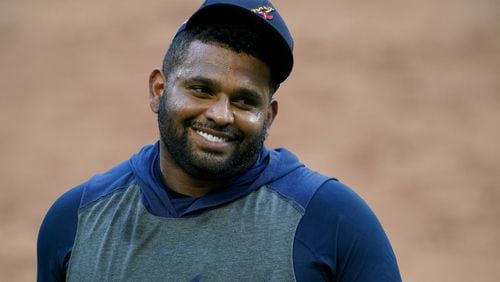 Atlanta Braves third baseman Pablo Sandoval smiles during batting practice before Game 5 of the National League Championship Series Friday, Oct. 16, 2020, against the Los Angeles Dodgers in Arlington, Texas. The Braves signed Sandoval to 1-year, minor league deal. (Tony Gutierrez/AP)