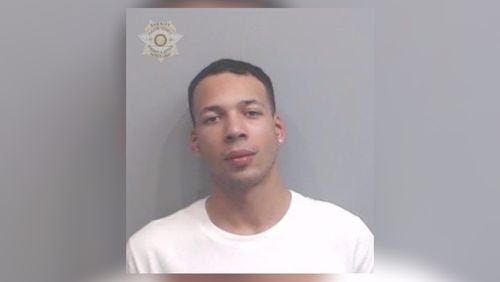 Damon John-Michael Wilson, 21, was arrested on murder and other charges in a January shooting that killed a security guard outside Encore Hookah Bar and Bistro on Luckie Street. (Credit: Fulton County Sheriff's Office)