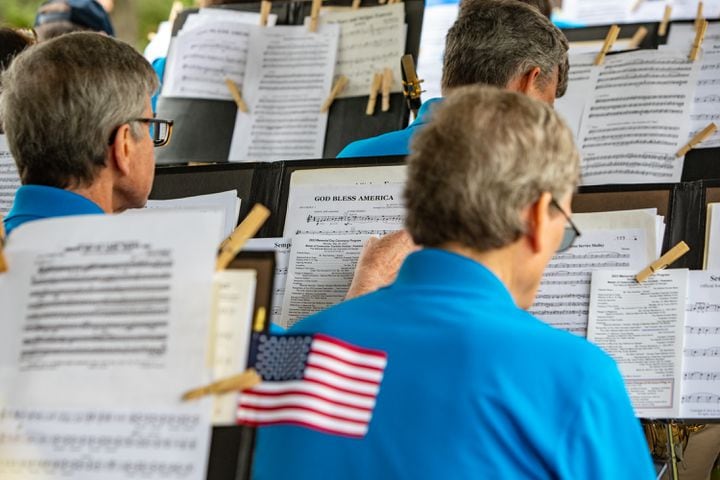 The Atlanta Concert Band prepares to perform ‘God Bless America’ during the 77th annual Memorial Day Observance at the Marietta National Cemetery on Monday, May 29, 2003.  (Jenni Girtman for The Atlanta Journal-Constitution)