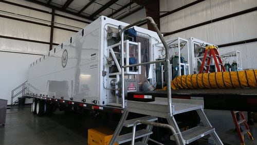 These Containerized Biological Containment Systems (CBCS) are maintained by Phoenix Air. They can handle multiple patients. BOB ANDRES /BANDRES@AJC.COM