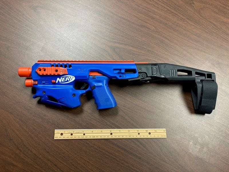 A drug raid in North Carolina turned up narcotics, cash and plenty of guns, including a Glock 19 semiautomatic pistol disguised as a toy Nerf gun. (Image: Catawba County NC Sheriff's Office)