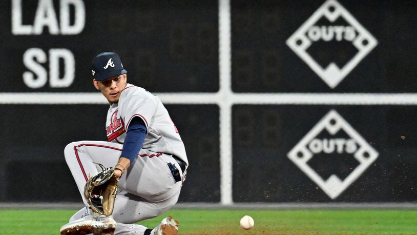 Atlanta Braves second baseman Vaughn Grissom (18) fields a grounder by Philadelphia Phillies’ Alec Bohm during the fifth inning of Game 3 of the National League Division Series at Citizens Bank Park in Philadelphia on Friday, October 14, 2022. (Hyosub Shin / Hyosub.Shin@ajc.com)