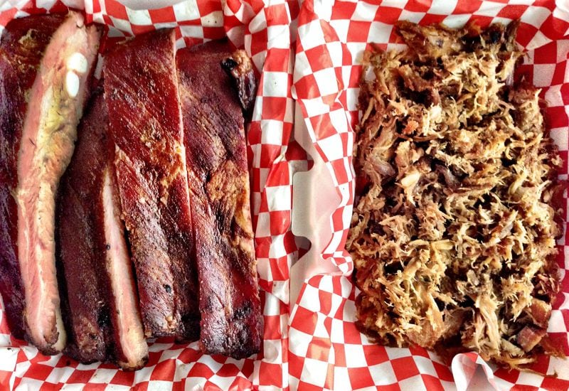 Pitmaster Bryan Fuhrman smokes pork ribs and pasture-raised whole hogs at B’s Cracklin’ BBQ. CONTRIBUTED BY WYATT WILLIAMS